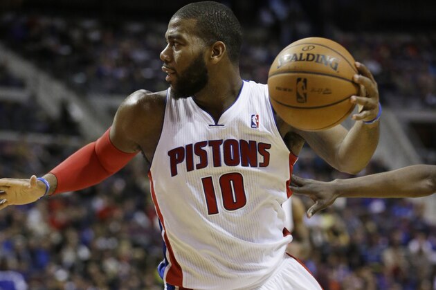 Detroit Pistons forward Greg Monroe (10) chases a loose ball during the second half of an NBA basketball game against the Chicago Bulls at the Palace in Auburn Hills, Mich., Wednesday, Nov. 27, 2013. (AP Photo/Carlos Osorio)