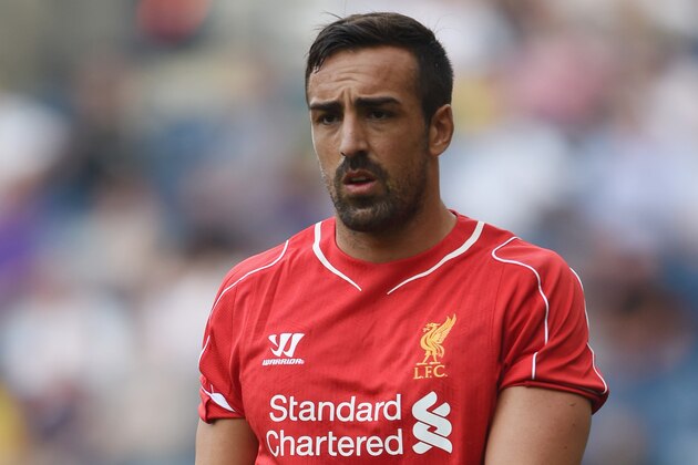 PRESTON, LANCASHIRE - JULY 19:  Jose Enrique of Liverpool in action during the pre season friendly match between Preston North End and Liverpool at Deepdale on July 19, 2014 in Preston, Lancashire.  (Photo by Michael Regan/Getty Images)