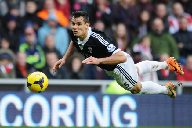 SUNDERLAND, ENGLAND - JANUARY 18:  Dejan Lovren of Southampton dives to head the ball during the Barclays Premier League match between Sunderland and Southampton at Stadium of Light on January 18, 2014 in Sunderland, England.  (Photo by Chris Brunskill/Getty Images)