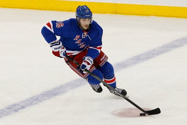 Dec 10, 2013; New York, NY, USA;  New York Rangers center Derick Brassard (16) carries the puck during the first period against the Nashville Predators at Madison Square Garden. Mandatory Credit: Anthony Gruppuso-USA TODAY Sports