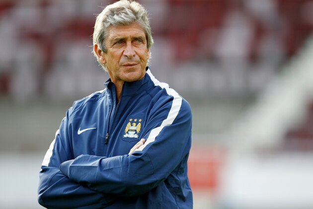 EDINBURGH, SCOTLAND - JULY 18: Manuel Pellegrini, manager of Manchester City before the pre-season friendly at Tynecastle Stadium on July 18, 2014 in Edinburgh, Scotland. (Photo by Richard Sellers/Getty Images)