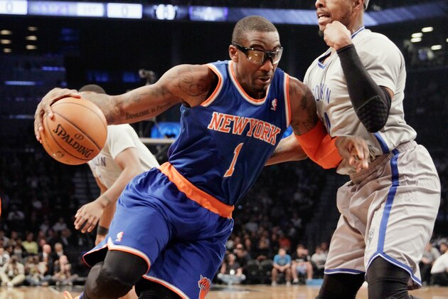 NEW YORK, NY - APRIL 15:  Amar'e Stoudemire #1 of the New York Knicks dribbles the ball against the Brooklyn Nets at the Barclays Center on April 15, 2014 in the Brooklyn borough of New York City. NOTE TO USER: User expressly acknowledges and agrees that, by downloading and/or using this Photograph, user is consenting to the terms and conditions of the Getty Images License Agreement.  (Photo by Bruce Bennett/Getty Images)