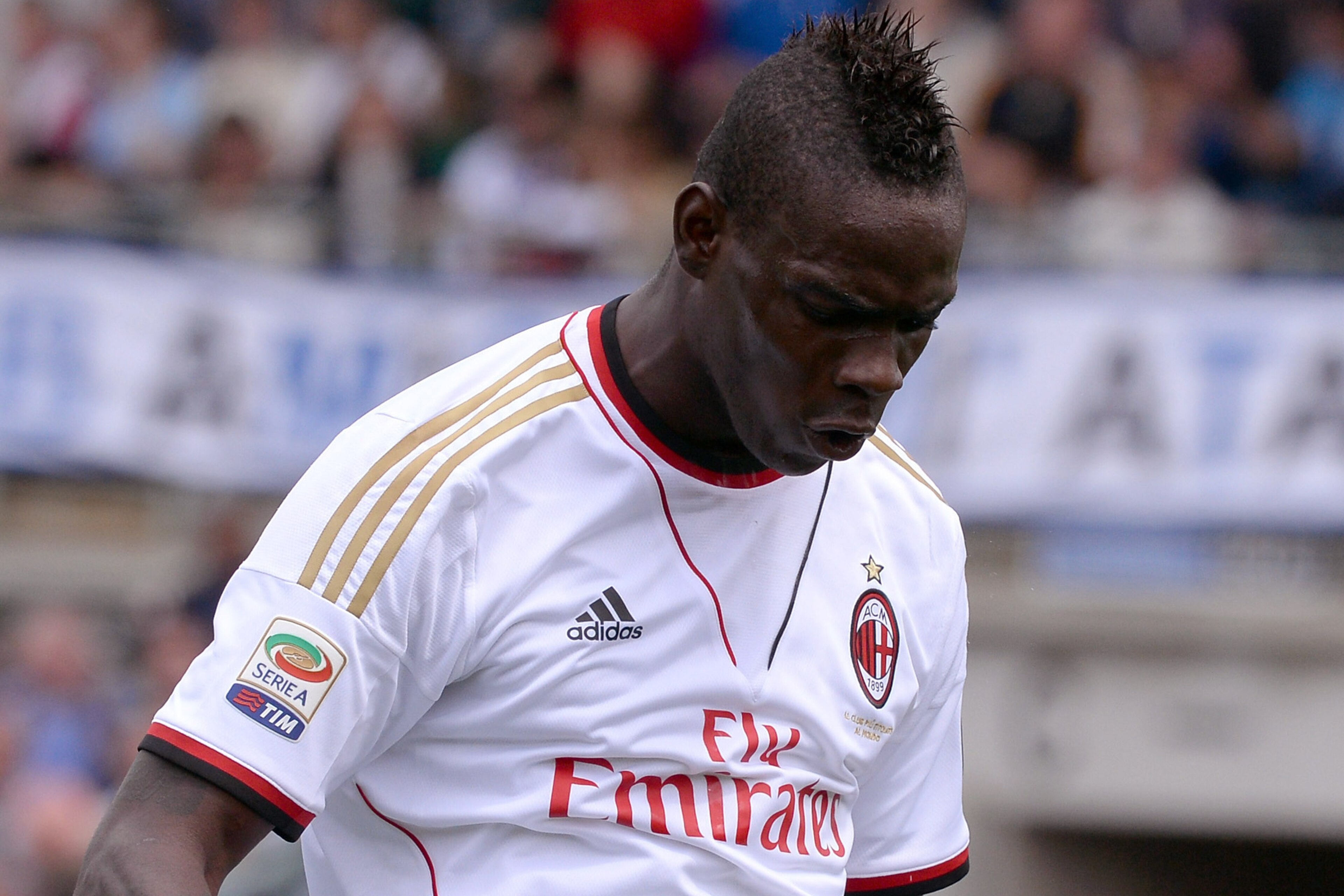 BERGAMO, ITALY - MAY 11: Mario Balotelli of AC Milan shows his dejection during the Serie A match between Atalanta BC and AC Milan at Stadio Atleti Azzurri d'Italia on May 11, 2014 in Bergamo, Italy. (Photo by Claudio Villa/Getty Images) BERGAMO, ITALY - MAY 11: Mario Balotelli of AC Milan shows his dejection during the Serie A match between Atalanta BC and AC Milan at Stadio Atleti Azzurri d'Italia on May 11, 2014 in Bergamo, Italy. (Photo by Claudio Villa/Getty Images)