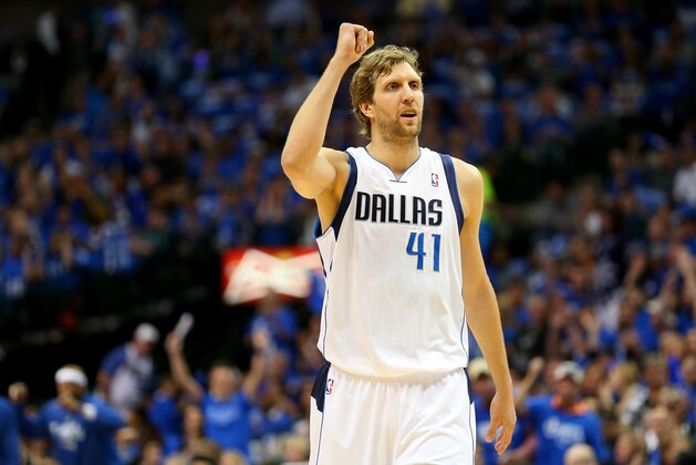 DALLAS, TX - MAY 02:  Dirk Nowitzki #41 of the Dallas Mavericks reacts against the San Antonio Spurs in Game Six of the Western Conference Quarterfinals during the 2014 NBA Playoffs at American Airlines Center on May 2, 2014 in Dallas, Texas. NOTE TO USER: User expressly acknowledges and agrees that, by downloading and or using this photograph, User is consenting to the terms and conditions of the Getty Images License Agreement.  (Photo by Ronald Martinez/Getty Images)