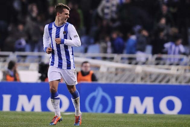 Real Sociedad's Antoine Griezmann of France, smiles after scoring his goal against FC Barcelona, during the Spanish League soccer match, at Anoeta stadium in San Sebastian, Spain, Saturday, Feb. 22, 2014. (AP Photo/Alvaro Barrientos) Real Sociedad's Antoine Griezmann of France, smiles after scoring his goal against FC Barcelona, during the Spanish League soccer match, at Anoeta stadium in San Sebastian, Spain, Saturday, Feb. 22, 2014. (AP Photo/Alvaro Barrientos)