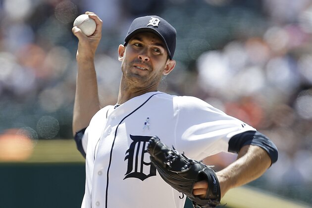 Detroit Tigers pitcher Rick Porcello throws against the Minnesota Twins in the first inning of a baseball game in Detroit, Sunday, June 15, 2014. (AP Photo/Paul Sancya)