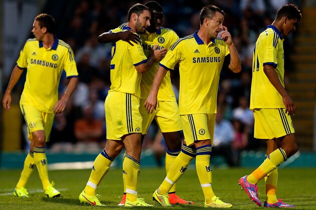 HIGH WYCOMBE, ENGLAND - JULY 16: Branislav Ivanovic of Chelsea celebrates with team mates after scoring a goal duing the pre season friendly match between Wycombe Wanderers and Chelsea at Adams Park on July 16, 2014 in High Wycombe, England.  (Photo by Ben Hoskins/Getty Images)