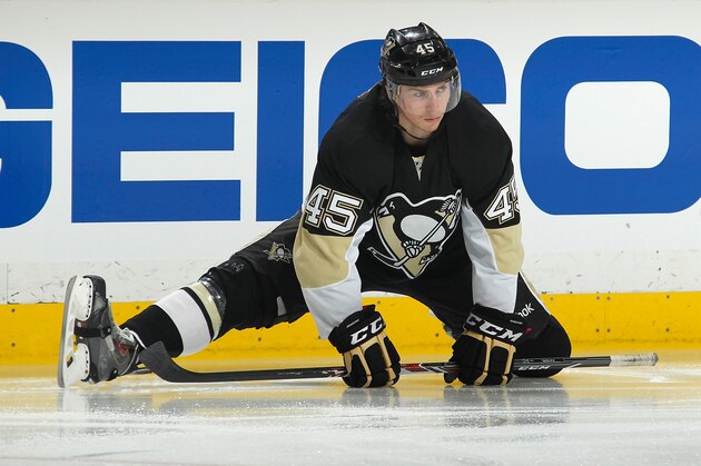 PITTSBURGH, PA - APRIL 9:  Adam Payerl #45 of the Pittsburgh Penguins stretches during the game against the Detroit Red Wings on April 9, 2014 at Consol Energy Center in Pittsburgh, Pennsylvania.  (Photo by Gregory Shamus/NHLI via Getty Images)