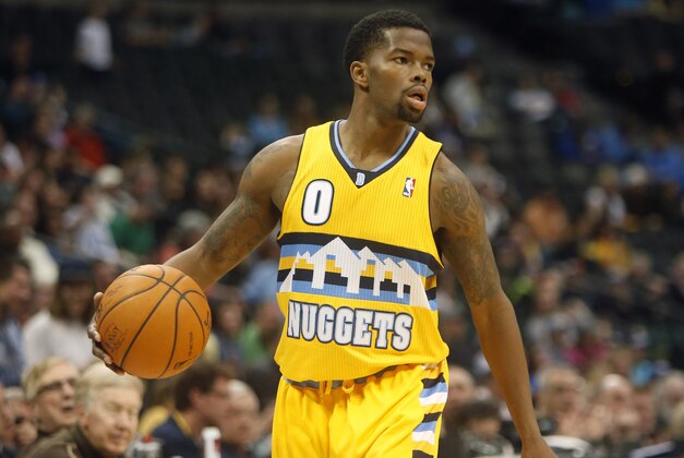 Apr 2, 2014; Denver, CO, USA; Denver Nuggets guard Aaron Brooks (0) with the ball during the second half against the New Orleans Pelicans at Pepsi Center.  The Nuggets won 137-107.  Mandatory Credit: Chris Humphreys-USA TODAY Sports