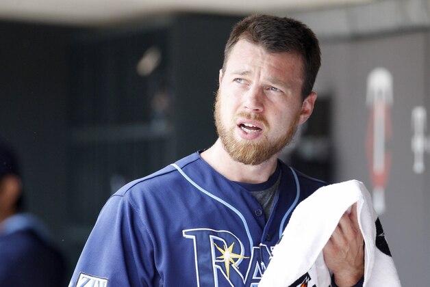 Tampa Bay Rays second baseman Ben Zobrist looks out of the dugout during the first inning of a baseball game against the Minnesota Twins in Minneapolis, Sunday, July 20, 2014. (AP Photo/Ann Heisenfelt)