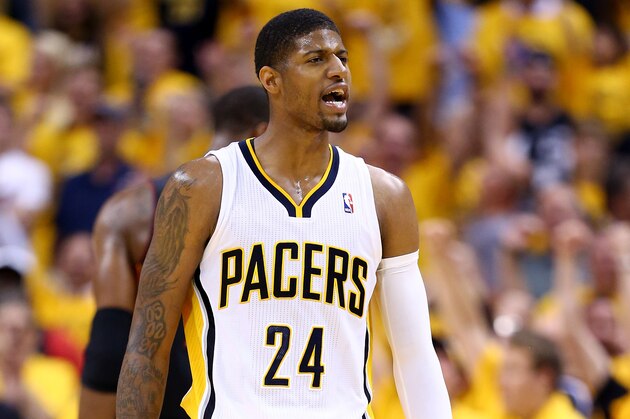 INDIANAPOLIS, IN - MAY 28:  Paul George #24 of the Indiana Pacers reacts against the Miami Heat during Game Five of the Eastern Conference Finals of the 2014 NBA Playoffs at Bankers Life Fieldhouse on May 28, 2014 in Indianapolis, Indiana. NOTE TO USER: User expressly acknowledges and agrees that, by downloading and or using this photograph, User is consenting to the terms and conditions of the Getty Images License Agreement.  (Photo by Andy Lyons/Getty Images)
