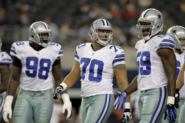 Dallas Cowboys defensive end Clifton Geathers (98),  Tyrone Crawford (70) and  Baraka Atkins (59) during a preseason NFL football game against the St. Louis Rams Saturday, Aug. 25, 2012, in Arlington, Texas. (AP Photo/LM Otero)