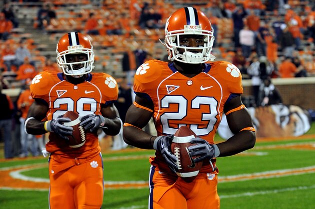 Clemson freshman running back Andre Ellington (23) leads senior C.J. Spiller (28) onto the field during the first half of their NCAA college football game against Florida State Saturday Nov.7, 2009 at Memorial Stadium in Clemson S.C. (AP Photo/ Richard Shiro) Clemson freshman running back Andre Ellington (23) leads senior C.J. Spiller (28) onto the field during the first half of their NCAA college football game against Florida State Saturday Nov.7, 2009 at Memorial Stadium in Clemson S.C. (AP Photo/ Richard Shiro)