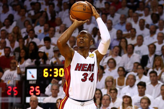 MIAMI, FL - JUNE 12:  Ray Allen #34 of the Miami Heat takes a shot against the San Antonio Spurs during Game Four of the 2014 NBA Finals at American Airlines Arena on June 12, 2014 in Miami, Florida. NOTE TO USER: User expressly acknowledges and agrees that, by downloading and or using this photograph, User is consenting to the terms and conditions of the Getty Images License Agreement.  (Photo by Andy Lyons/Getty Images)