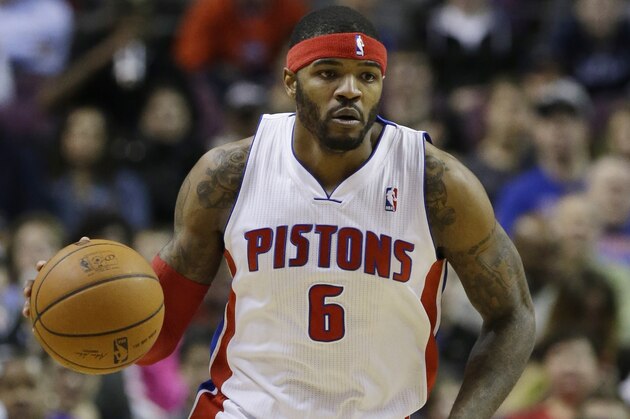 Detroit Pistons forward Josh Smith (6) brings the ball downcourt during the second half of an NBA basketball game against the San Antonio Spurs at the Palace of Auburn Hills, Mich., Monday, Feb. 10, 2014. (AP Photo/Carlos Osorio)