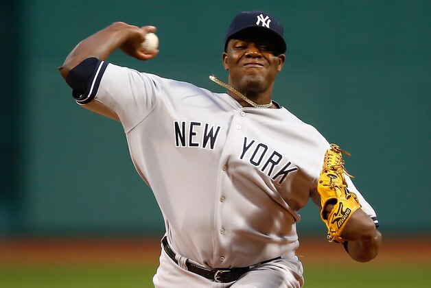 BOSTON, MA - APRIL 23:  Michael Pineda #35 of the New York Yankees pitches against the Boston Red Sox during the game at Fenway Park on April 23, 2014 in Boston, Massachusetts.  (Photo by Jared Wickerham/Getty Images)