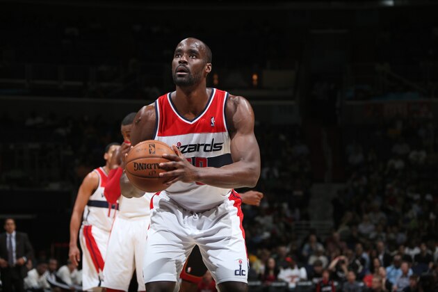 WASHINGTON, DC - APRIL 10:  Emeka Okafor #50 of the Washington Wizards attempts a foul shot against the Miami Heat at the Verizon Center on April 10, 2013 in Washington, DC. NOTE TO USER: User expressly acknowledges and agrees that, by downloading and or using this photograph, User is consenting to the terms and conditions of the Getty Images License Agreement. Mandatory Copyright Notice: Copyright 2013 NBAE (Photo by Ned Dishman/NBAE via Getty Images)
