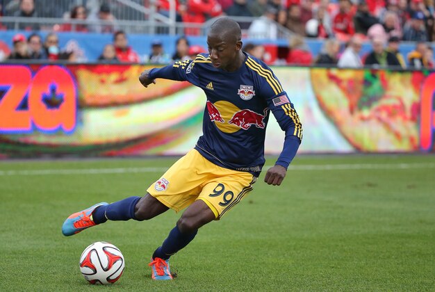 May 17, 2014; Toronto, Ontario, CAN; New York Red Bulls forward Bradley Wright-Phillips (99) plays a cross against the Toronto FC at BMO Field. The FC beat the Red Bulls 2-0. Mandatory Credit: Tom Szczerbowski-USA TODAY Sports