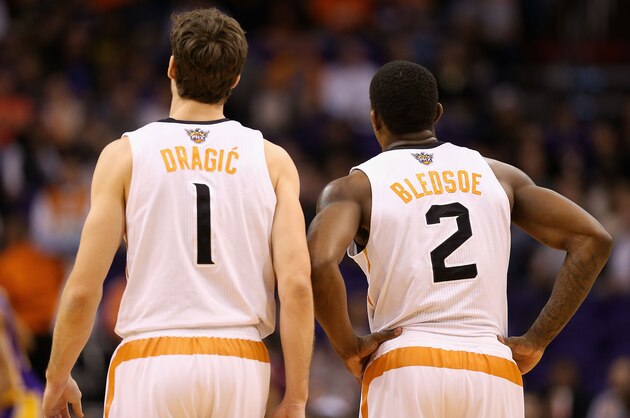 PHOENIX, AZ - DECEMBER 23:  Goran Dragic #1 and Eric Bledsoe #2 of the Phoenix Suns during the NBA game against the Los Angeles Lakers at US Airways Center on December 23, 2013 in Phoenix, Arizona.  NOTE TO USER: User expressly acknowledges and agrees that, by downloading and or using this photograph, User is consenting to the terms and conditions of the Getty Images License Agreement.  (Photo by Christian Petersen/Getty Images)