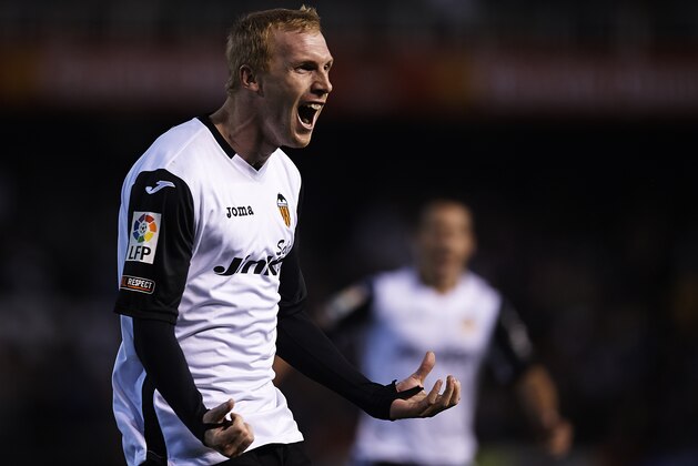 VALENCIA, SPAIN - DECEMBER 22:  Jeremy Mathieu of Valencia celebrates after scoring during the La Liga match between Valencia CF and Real Madrid CF at Estadio Mestalla on December 22, 2013 in Valencia, Spain.  (Photo by Manuel Queimadelos Alonso/Getty Images)