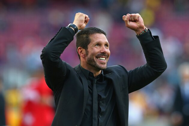 BARCELONA, SPAIN - MAY 17:  Diego Simeone the coach of Club Atletico de Madrid celebrates towards his supporters after winning the La Liga after the match between FC Barcelona and Club Atletico de Madrid at Camp Nou on May 17, 2014 in Barcelona, Spain.  (Photo by Alex Livesey/Getty Images)