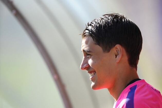 FC Barcelona's Bojan Krkic arrives for a training session at the Sports Center FC Barcelona Joan Gamper in San Joan Despi, Spain, Friday, July 18, 2014. (AP Photo/Manu Fernandez)