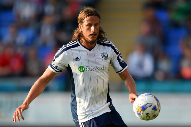 SHREWSBURY, ENGLAND - JULY 15:  West Brom player Jonas Olsson in action during a pre season friendly between Shrewsbury Town and West Bromwich Albion at Greenhous Meadow on July 15, 2014 in Shrewsbury, England.  (Photo by Stu Forster/Getty Images)