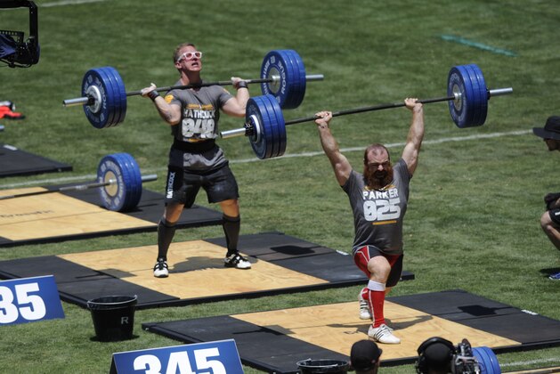 Jul 27, 2013; Carson, CA, USA; Lucas Parker (right) and Matt Hathcock (left) participates in the men's clean and jerk during the the CrossFit Games at the StubHub Center. Mandatory Credit: Kelvin Kuo-USA TODAY Sports