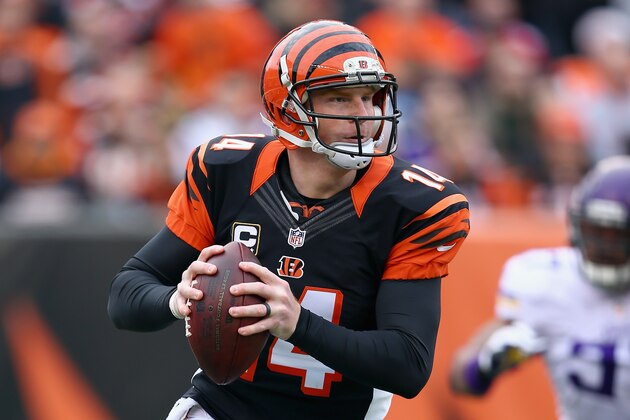 CINCINNATI, OH - DECEMBER 22:  Andy Dalton #14 of the Cincinnati Bengals runs with the ball during the NFL game against the Minnesota Vikings at Paul Brown Stadium on December 22, 2013 in Cincinnati, Ohio.  (Photo by Andy Lyons/Getty Images)
