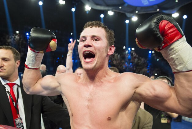 German Robert Stieglitz celebrates after winning the WBO super middleweight world champion bout against defending champion Arthur Abraham with technical knockout in Magdeburg, Germany, Sunday, March 24, 2013. (AP Photo/Gero Breloer)