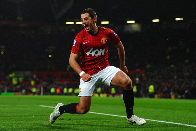 MANCHESTER, ENGLAND - NOVEMBER 24:  Javier Hernandez of Manchester United celebrates scoring his team's third goal to make the score 3-1 during the Barclays Premier League match between Manchester United and Queens Park Rangers at Old Trafford on November 24, 2012 in Manchester, England.  (Photo by Laurence Griffiths/Getty Images)
