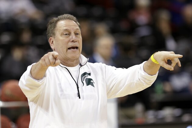 Michigan State head coach Tom Izzo directs his team during practice for the NCAA college basketball tournament in Spokane, Wash., Wednesday, March 19, 2014. Michigan State plays against Delaware in a second round game on Thursday. (AP Photo/Elaine Thompson)