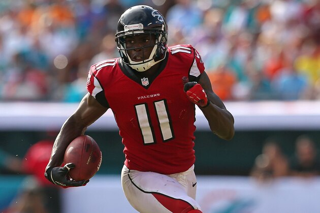 MIAMI GARDENS, FL - SEPTEMBER 22: Julio Jones #11 of the Atlanta Falcons rushes during a game against the Miami Dolphins at Sun Life Stadium on September 22, 2013 in Miami Gardens, Florida.  (Photo by Mike Ehrmann/Getty Images)