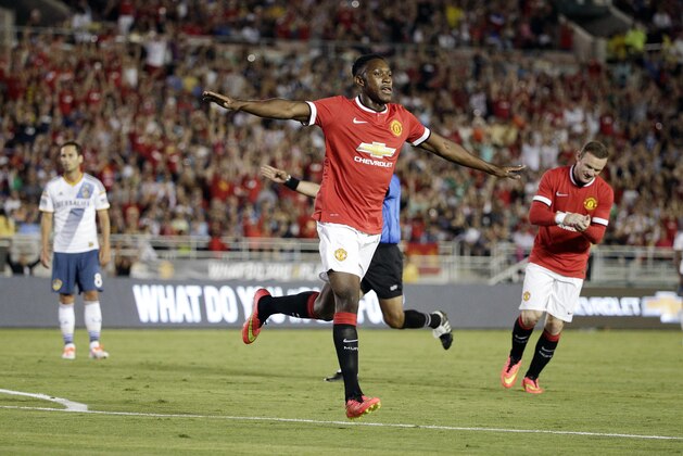 Manchester United's Danny Welbeck celebrates after scoring against the Los Angeles Galaxy during the first half of a friendly soccer match at Rose Bowl on Wednesday, July 23, 2014, in Pasadena, Calif. (AP Photo)