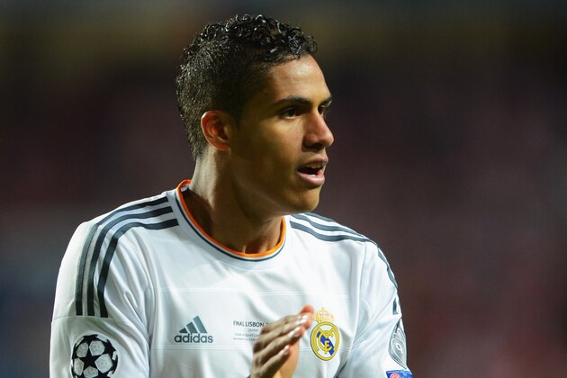 LISBON, PORTUGAL - MAY 24:  Raphael Varane of Real Madrid applauds during the UEFA Champions League Final between Real Madrid and Atletico de Madrid at Estadio da Luz on May 24, 2014 in Lisbon, Portugal.  (Photo by Michael Regan/Getty Images)