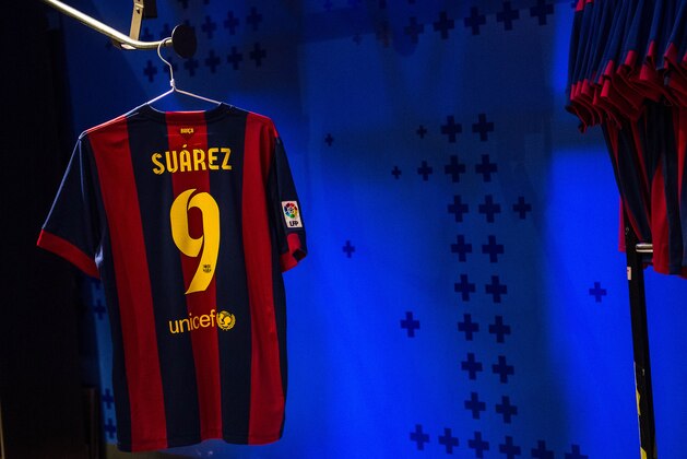 BARCELONA, SPAIN - JULY 12:  A shirt of new FC Barcelona player Luis Suarez are seen on display at the FC Barcelona official store on July 12, 2014 in Barcelona, Spain.  (Photo by David Ramos/Getty Images)