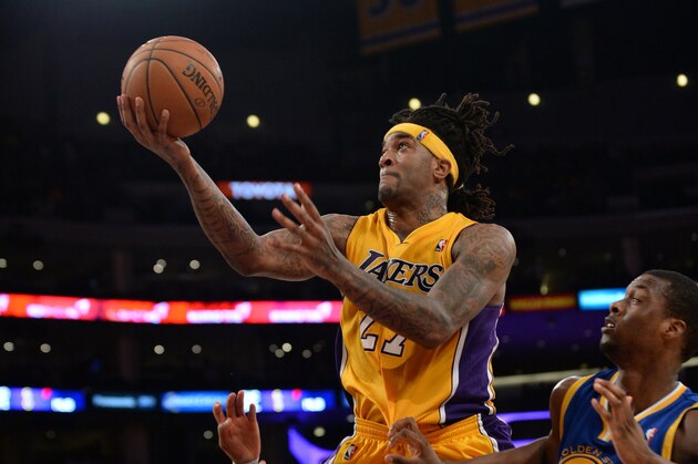 LOS ANGELES, CA - APRIL 11: Jordan Hill #27 of the Los Angeles Lakers shoots against the Golden State Warriors at Staples Center on April 11, 2014 in Los Angeles, California. NOTE TO USER: User expressly acknowledges and agrees that, by downloading and/or using this Photograph, user is consenting to the terms and conditions of the Getty Images License Agreement. Mandatory Copyright Notice: Copyright 2014 NBAE (Photo by Noah Graham/NBAE via Getty Images)