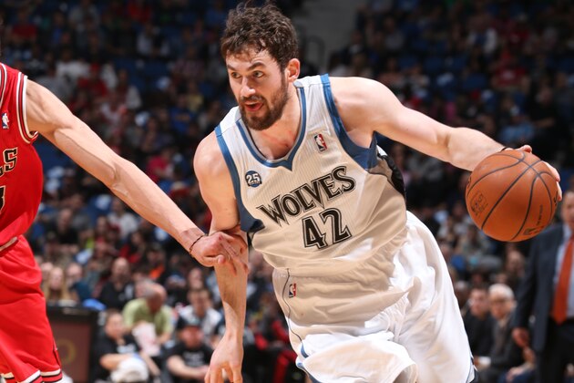 MINNEAPOLIS, MN - April 9: Kevin Love #42 of the Minnesota Timberwolves handles the ball against the Chicago Bulls during the game on April 9, 2014 at Target Center in Minneapolis, Minnesota. NOTE TO USER: User expressly acknowledges and agrees that, by downloading and or using this Photograph, user is consenting to the terms and conditions of the Getty Images License Agreement. Mandatory Copyright Notice: Copyright 2014 NBAE (Photo by David Sherman/NBAE via Getty Images)