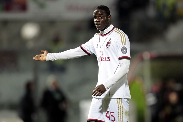 LIVORNO, ITALY - DECEMBER 07: Mario Balotelli of AC Milan in action during the Serie A match between AS Livorno and AC Milan at Stadio Armando Picchi on December 7, 2013 in Livorno, Italy.  (Photo by Gabriele Maltinti/Getty Images)