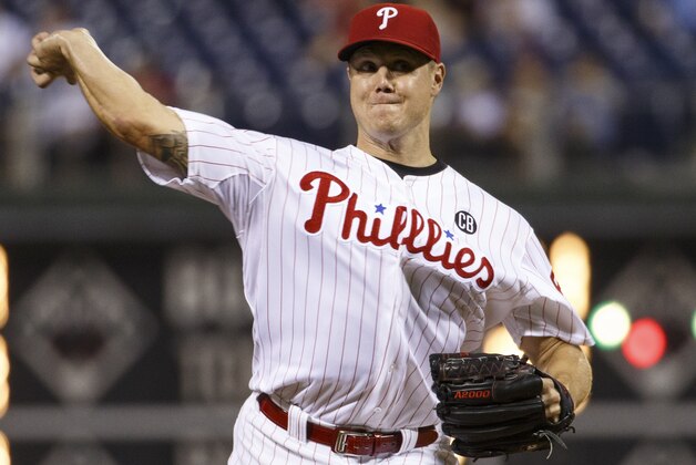 Philadelphia Phillies relief pitcher Jonathan Papelbon pitches during the ninth inning of a baseball game against the San Francisco Giants, Wednesday, July 23, 2014, in Philadelphia. The Giants won 3-1. (AP Photo/Chris Szagola)
