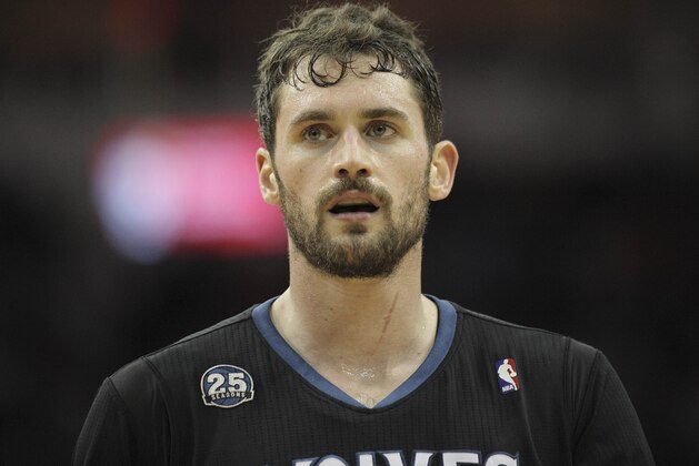 Mar 20, 2014; Houston, TX, USA; Minnesota Timberwolves forward Kevin Love (42) on the court during the third quarter against the Houston Rockets at Toyota Center. Mandatory Credit: Andrew Richardson-USA TODAY Sports