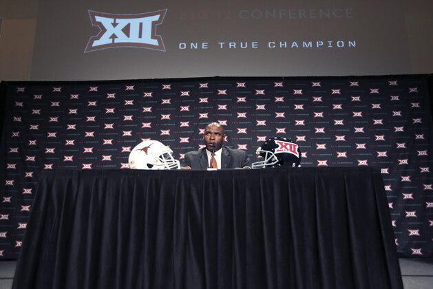 Texas head coach Charlie Strong listens to a question from a reporter during the NCAA college Big 12 Conference football media days in Dallas, Tuesday, July 22, 2014. (AP Photo)