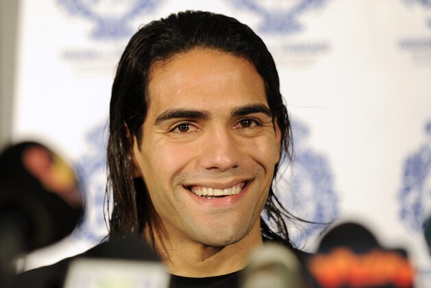 Colombian soccer star Radamel Falcao reacts as he attends a news conference at the Trindade Hospital in Porto, Portugal, Monday, Jan. 27, 2014. Colombia and Monaco's striker Falcao is in a race against time to get fit for the World Cup in June after undergoing knee surgery Saturday, Jan. 25, with his doctor giving him a better than 50-50 chance of making it. (AP Photo/Paulo Duarte)