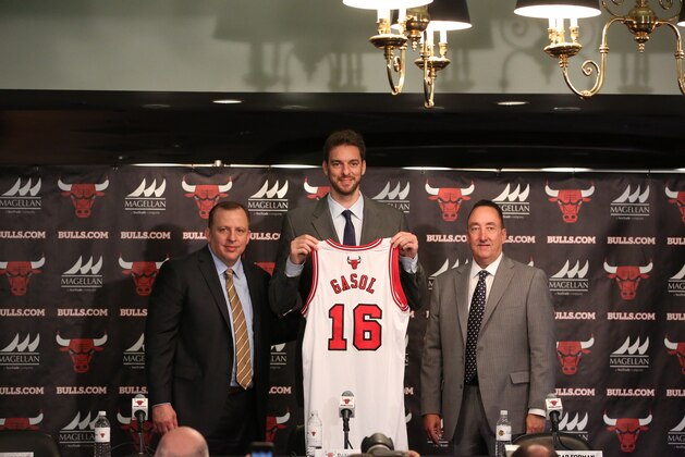 CHICAGO, IL - JULY 18: Chicago Bulls head coach Tom Thibodeau and general manager Gar Forman introduce newly-signed free agent Pau Gasol during a press conference at the United Center on July 18, 2014  in Chicago, Illinois. NOTE TO USER:  User expressly acknowledges and agrees that, by downloading and or using this Photograph, user is consenting to the terms and conditions of the Getty Images License Agreement.  Mandatory Copyright Notice:  Copyright 2014 NBAE (Photo by Gary Dineen/NBAE via Getty Images)