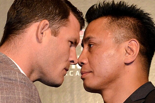 HONG KONG - JUNE 24: Michael Bisping (L) with his opponent Cung Le (R) during the Macao UFC Fight Night Press Conference at the Four Season Hotel on June 24, 2014 in Hong Kong, Hong Kong.  (Photo by Jayne Russell/Getty Images)