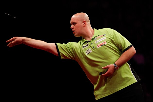 LONDON, ENGLAND - MAY 22: Michael van Gerwen of the Netherlands in action during the McCoys Premier League Darts Play-Offs Semi Final match between Michael van Gerwen and Gary Anderson at O2 Arena on May 22, 2014 in London, England.  (Photo by Ben Hoskins/Getty Images)