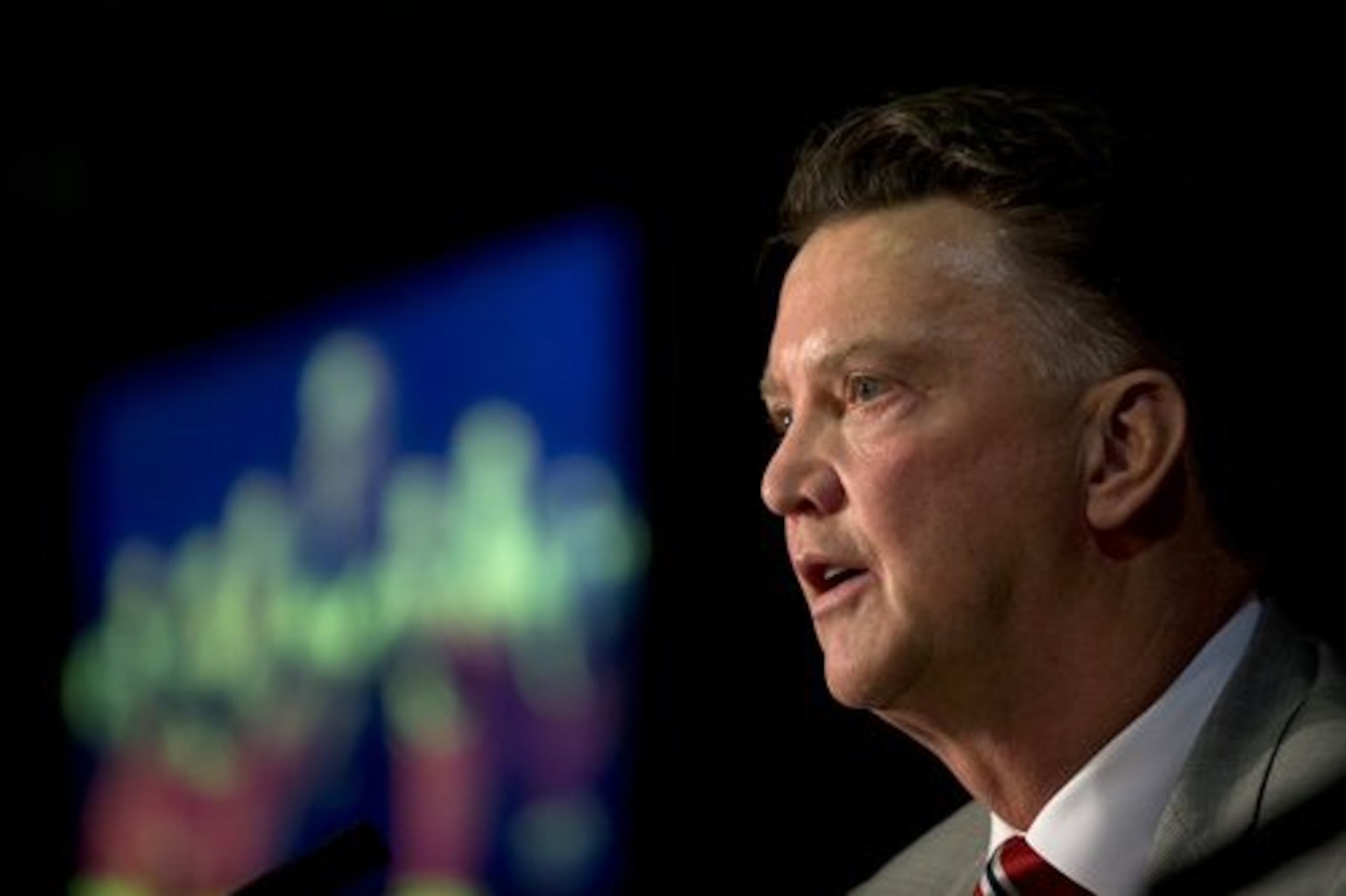 Manchester United's new manager Louis van Gaal speaks during a press conference at Old Trafford Stadium, Manchester, England, Thursday July 17, 2014. The new manager takes over after recently guiding Holland to third pace at the 2014 World Cup. (AP Photo/Jon Super)