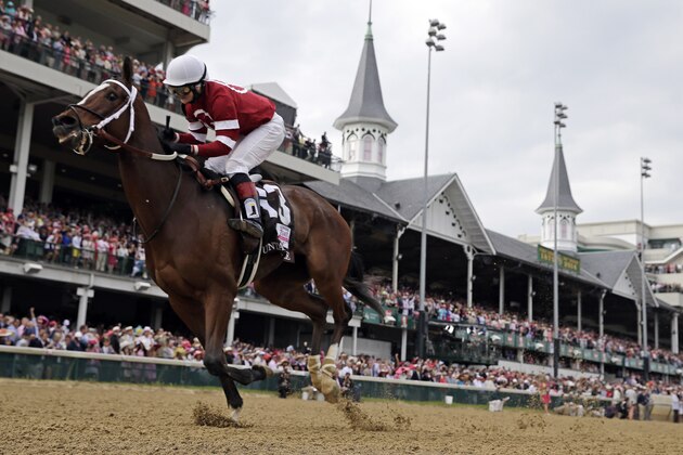 Rosie Napravnik rides Untapable to victory during the 140th running of the Kentucky Oaks horse race at Churchill Downs Friday, May 2, 2014, in Louisville, Ky. (AP Photo/David J. Phillip) Rosie Napravnik rides Untapable to victory during the 140th running of the Kentucky Oaks horse race at Churchill Downs Friday, May 2, 2014, in Louisville, Ky. (AP Photo/David J. Phillip)