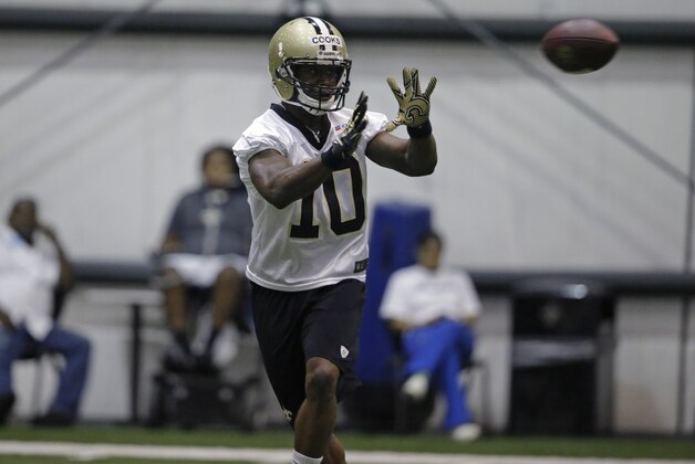 New Orleans Saints first round draft pick Brandin Cooks (10) works out during OTA workouts at their NFL football training facility in Metairie, La., Thursday, June 19, 2014. (AP Photo/Gerald Herbert)