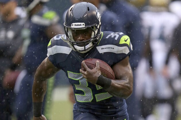 Christine Michael #33 of the Seattle Seahawks runs the ball in pre game before an NFL game against the Jacksonville Jaguars at CenturyLink Field in Seattle on Sunday, Sept. 22 2013. (AP Photo/David Seelig) Christine Michael #33 of the Seattle Seahawks runs the ball in pre game before an NFL game against the Jacksonville Jaguars at CenturyLink Field in Seattle on Sunday, Sept. 22 2013. (AP Photo/David Seelig)